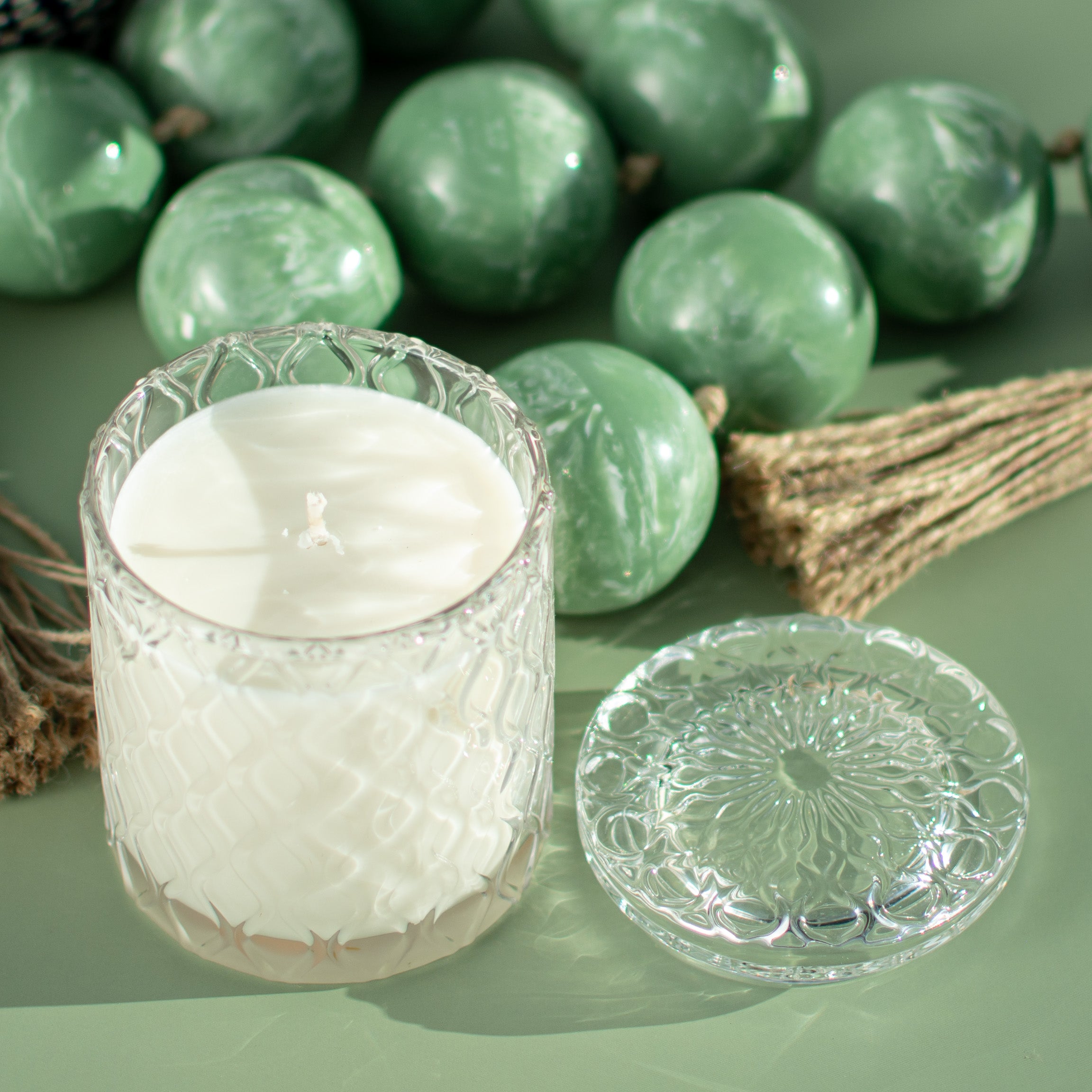 The Vienna fragrance free candle by Unscented Candle Company on green background